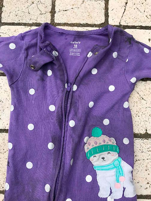 fire-damaged baby clothes