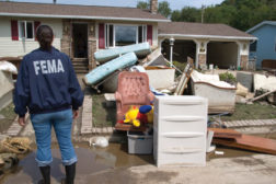 woman fema jacket ruined home